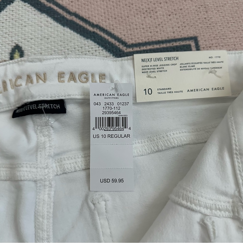 American Eagle White Stretch Ripped Super Hi-Rise Jegging Crop Jeans - Picture 5 of 16